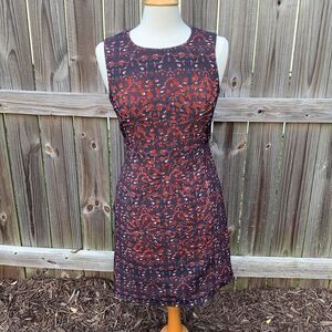 McGinn sheath dress, laser cutouts, pockets, size 4